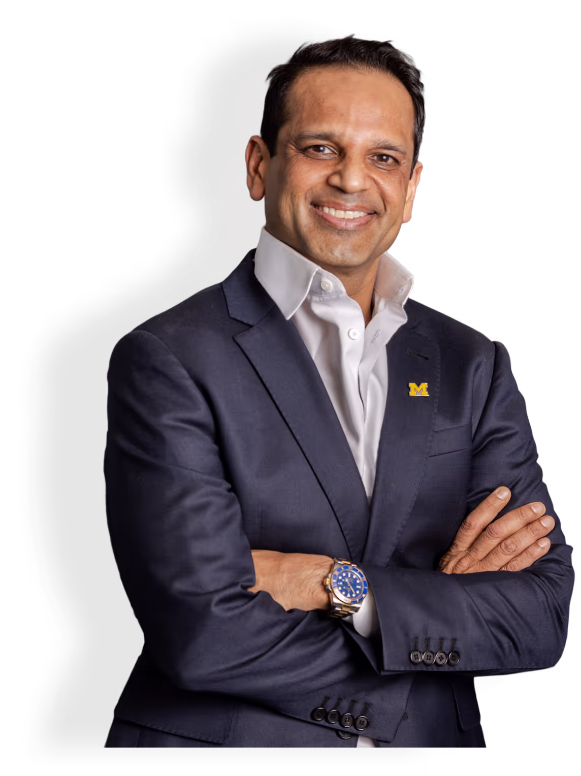 Man in suit smiling confidently